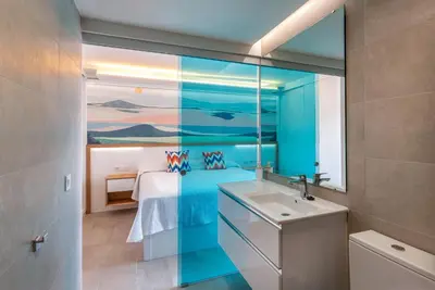 Un baño de Apartments Sydenbygg Arguineguin