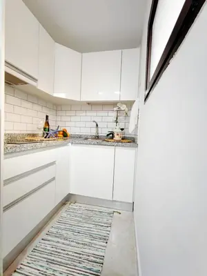 Una cocina o zona de cocina en Guinea Nidive apartment
