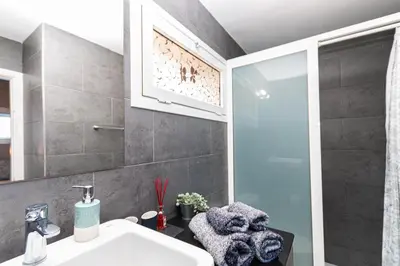 Un baño de Very Romantic Seaview Apartment Patalavaca Mogán with Warm Pool