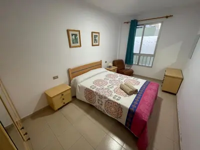 Cama o camas de una habitación en Apartamento colón arinaga