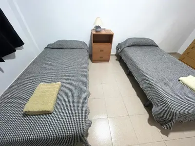 Cama o camas de una habitación en Apartamento colón arinaga