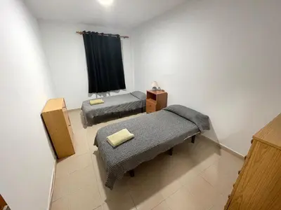 Cama o camas de una habitación en Apartamento colón arinaga
