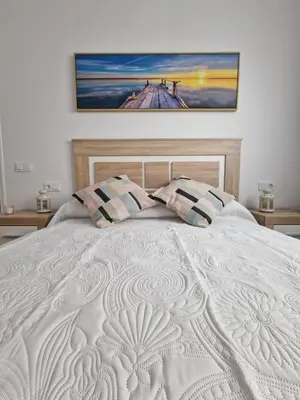 Cama o camas de una habitación en Alojamientos Agaete Pueblo Nº4 y Nº5