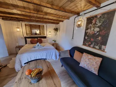 Cama o camas de una habitación en El Nido Fuente Hervera. Precioso Loft con Bañera de Hidromasaje