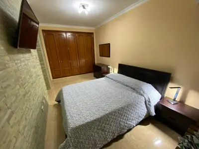 Cama o camas de una habitación en Villa Mogan Mall, con jacuzzi y PlayStation 5