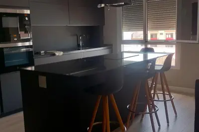 Una cocina o zona de cocina en luminoso duplex en Las Canteras (Surf Zone)