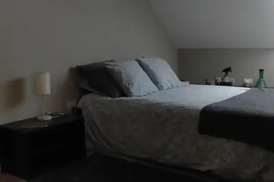 Cama o camas de una habitación en luminoso duplex en Las Canteras (Surf Zone)