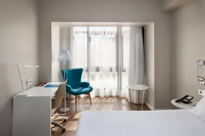Cama o camas de una habitación en NH Las Palmas Playa las Canteras