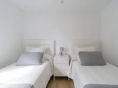 Cama o camas de una habitación en Olas Suites Playa del Ingles