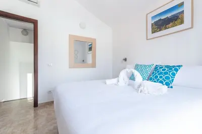 Cama o camas de una habitación en Home2Book Cozy Duplex Green Oasis Maspalomas