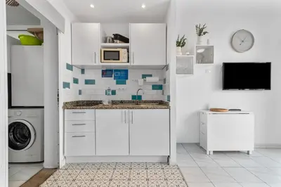 Una cocina o zona de cocina en Home2Book Cozy Duplex Green Oasis Maspalomas