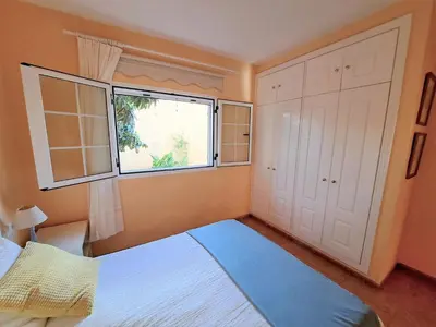 Cama o camas de una habitación en Your place in Arguineguin, Wifi, Swimmingpool and Free Parking
