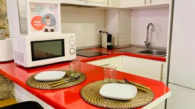 Una cocina o zona de cocina en Palm apartment
