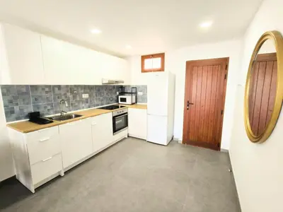 Una cocina o zona de cocina en Acogedor Octavo Hábitat by CASAS COCODRILO