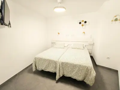 Cama o camas de una habitación en Acogedor Octavo Hábitat by CASAS COCODRILO