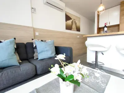 Zona de estar de Light Blue Holiday Home
