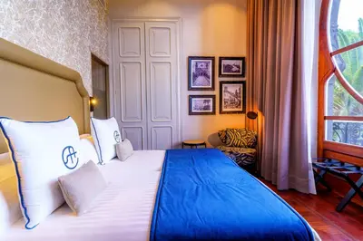 Cama o camas de una habitación en Boutique Hotel Cordial Plaza Mayor de Santa Ana