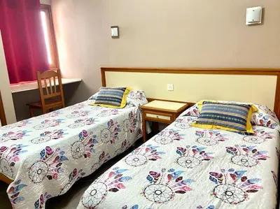 Cama o camas de una habitación en Apartamento vista mar en Flamboyan - San Agustín