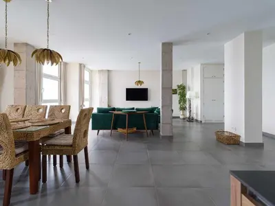 Una televisión o centro de entretenimiento en SG Big Ocean Deluxe