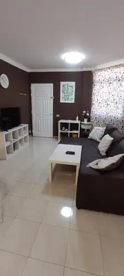 Una televisión o centro de entretenimiento en Casa TINGUARO