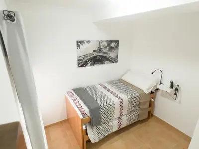 Cama o camas de una habitación en Home2Book Ático Blue Beach, Pool&Terrace