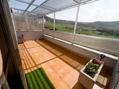 Un balcón o terraza de Home2Book Ático Blue Beach, Pool&Terrace