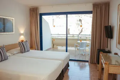 Cama o camas de una habitación en Hotel LIVVO Lago Taurito & Aquapark