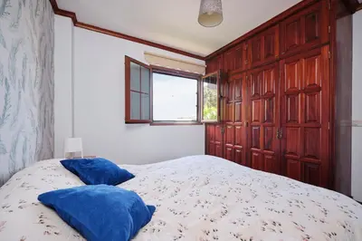 Cama o camas de una habitación en La casita del puerto