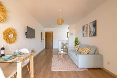 Una televisión o centro de entretenimiento en Beach house Playa del Inglés