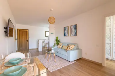 Una televisión o centro de entretenimiento en Beach house Playa del Inglés