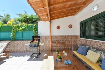 Zona de estar de Bungalow Sonnenland Los Tinos II by VillaGranCanaria