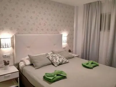 Cama o camas de una habitación en Molinos holidays playa del inglés