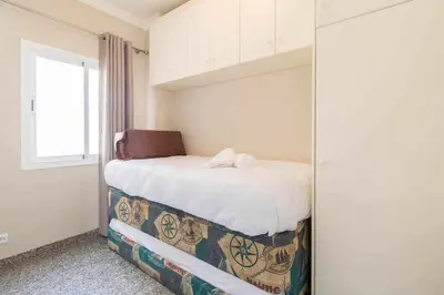 Cama o camas de una habitación en Atamanja Beach Apatment Playa de Las Canteras