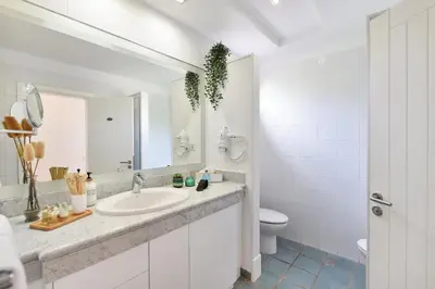 Un baño de El Flamboyan Golf by VillaGranCanaria