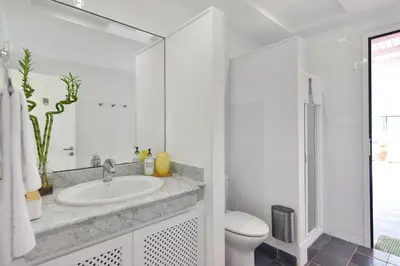 Un baño de El Flamboyan Golf by VillaGranCanaria