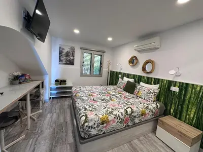 Cama o camas de una habitación en First Beachline Deluxe with Garden and Terrasse in Sun Club