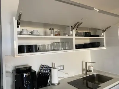 Una cocina o zona de cocina en First Beachline Deluxe with Garden and Terrasse in Sun Club