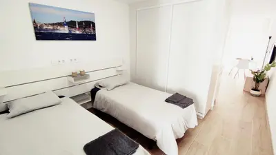 Cama o camas de una habitación en Pequeño, céntrico y acogedor 4th by CASAS COCODRILO