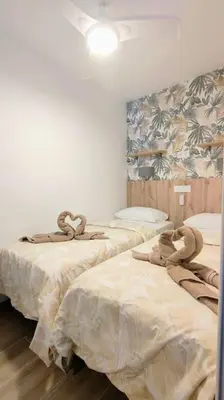 Cama o camas de una habitación en Pequeño y acogedor 4th by CASAS COCODRILO