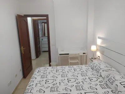 Cama o camas de una habitación en Playa Canteras Aqui Te Espero