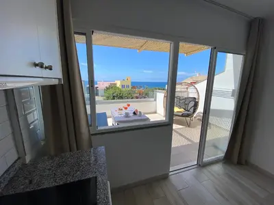 Un balcón o terraza de SUNNY DAY Deluxe 1