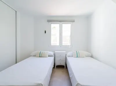 Cama o camas de una habitación en Albaricoques Suites Maspalomas