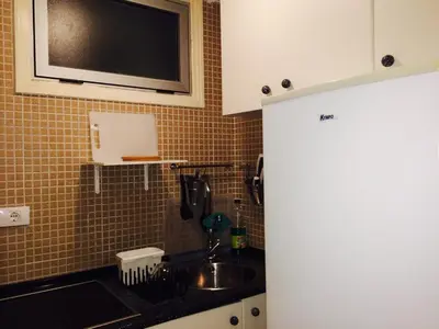 Una cocina o zona de cocina en El Rincón de Inés - Las Canteras Beachfront