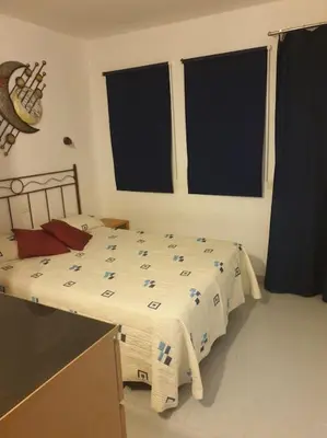 Cama o camas de una habitación en Apartamento situado en Maspalomas