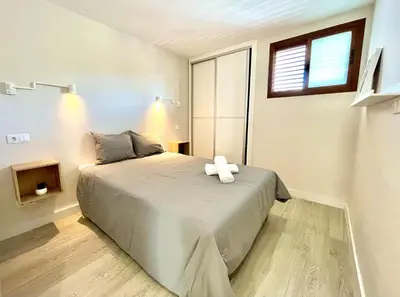 Cama o camas de una habitación en Timeless clock Apartment