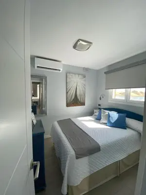 Cama o camas de una habitación en Apartamento Oasis Palmeras 4