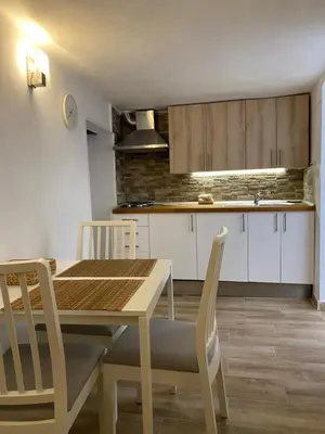 Una cocina o zona de cocina en Casas La Aldea Suites Plaza