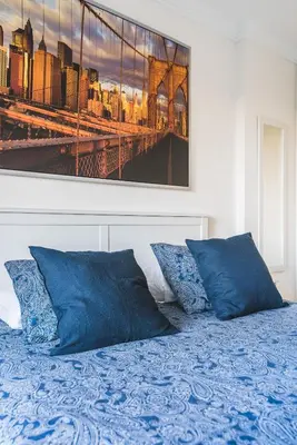 Cama o camas de una habitación en Home2Book Comfy Apartment Rambla