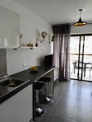 Una cocina o zona de cocina en Apartamento Robi en Cumana II - Puerto Rico - Ap 508