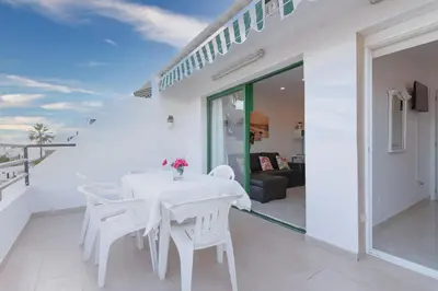 Un balcón o terraza de APARTAMENTO SCORPIO 514 by Homestaygrancanaria